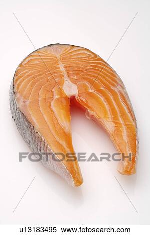 Stock Photography - Close-up of a piece of raw fish. Fotosearch