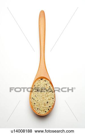 Close-up of a spoon of food View Large Photo Image Stock Photo - Close-up of a spoon of food. Fotosearch