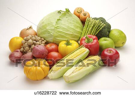 Stock Image - Close-up of different kinds of vegetables and fruits. Fotosearch