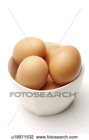 Stock Image - Close-up of eggs in a bowl. Fotosearch