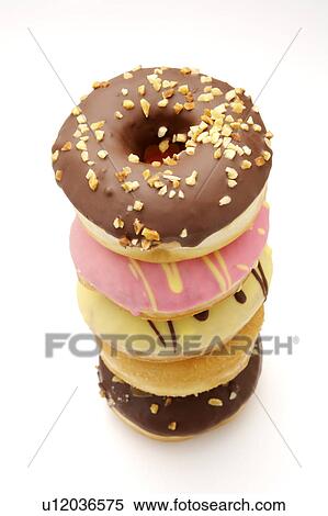 Close-up of five donuts View Large Photo Image Stock Photography - Close-up of five donuts. Fotosearch