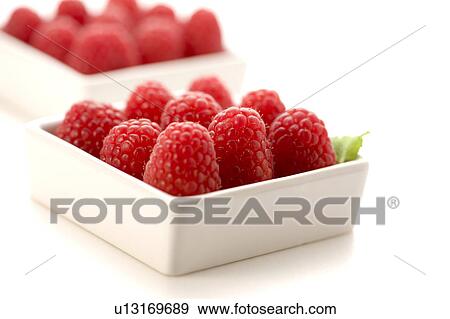 Close-up of raspberries in a box View Large Photo Image Stock Photo - Close-up of raspberries in a box. Fotosearch