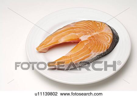 Stock Image - Close-up of sashimi on a plate. Fotosearch