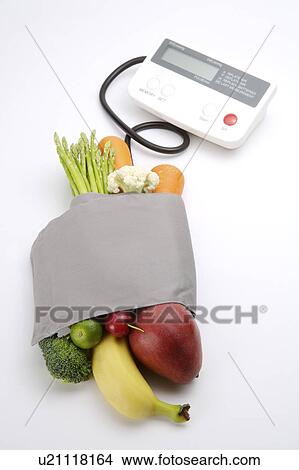 Blood pressure gauge around different kinds of fruits and vegetables, close-up View Large Photo Image Picture - Blood pressure gauge around different kinds of fruits and vegetables, close-up. Fotosearch