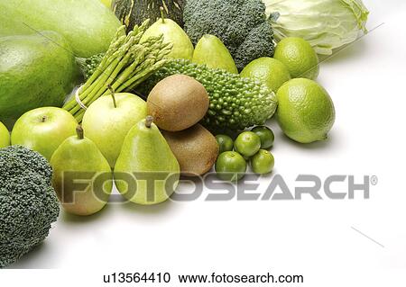 Stock Image - Close-up of a stack of different kinds of fruits and vegetables. Fotosearch