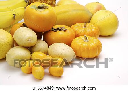 Stock Photograph of Close-up of a stack of different kinds of yellow ...