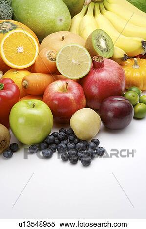Close-up of a stack of different kinds of fruits and vegetables View Large Photo Image Stock Photography - Close-up of a stack of different kinds of fruits and vegetables. Fotosearch