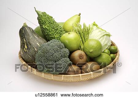 Close-up of a stack of fresh fruits and vegetables in a dustpan View Large Photo Image Stock Image - Close-up of a stack of fresh fruits and vegetables in a dustpan. Fotosearch