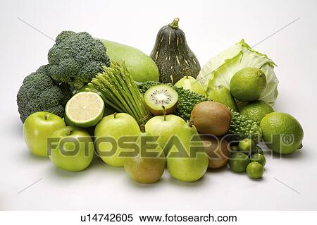 Close-up of a stack of green fruits and vegetables View Large Photo Image Stock Photography - Close-up of a stack of green fruits and vegetables. Fotosearch