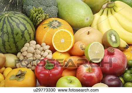Close-up of different kinds of fruits and vegetables View Large Photo Image Stock Image - Close-up of different kinds of fruits and vegetables. Fotosearch
