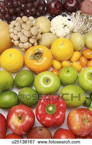 Stock Photo - Close-up of different kinds of fruits and vegetables. Fotosearch