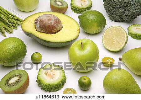 Close-up of different kinds of green fruits and vegetables View Large Photo Image Stock Photo - Close-up of different kinds of green fruits and vegetables. Fotosearch