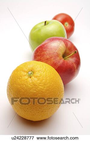 Close-up of four fruits in a row View Large Photo Image Stock Photo - Close-up of four fruits in a row. Fotosearch