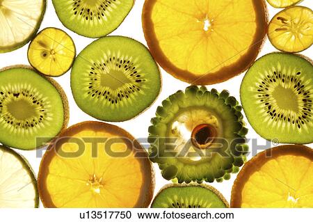 Stock Image - Close-up of section of different kinds of fruits and vegetables. Fotosearch