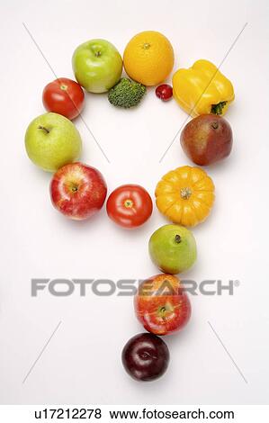Stock Photo - Fruits and vegetables in the shape of number 9, close-up. Fotosearch