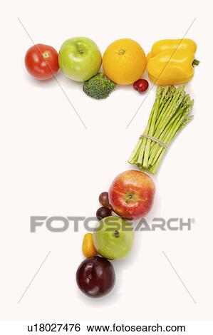 Stock Photograph - Fruits and vegetables in the shape of number 7, close-up. Fotosearch