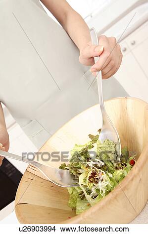 Japanese woman making a salad View Large Photo Image Picture - Japanese woman making a salad. Fotosearch