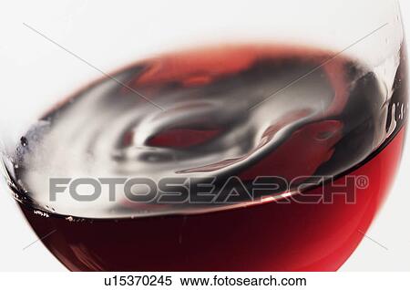 Close-up of red wine in glass View Large Photo Image Stock Photography - Close-up of red wine in glass. Fotosearch