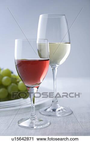 Rose and red wine View Large Photo Image Stock Image - Rose and red wine. Fotosearch