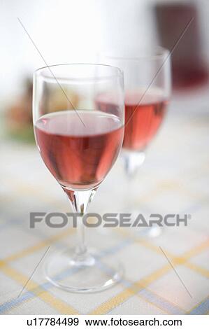 Stock Photo - Two glasses of red wine. Fotosearch