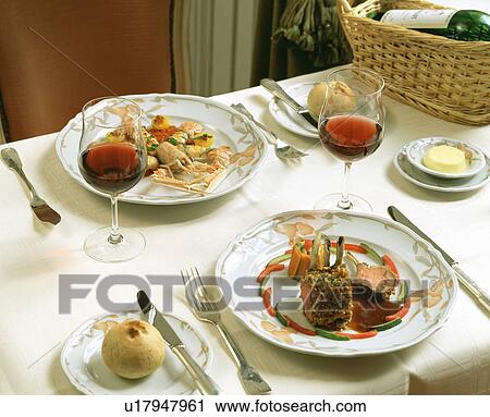 Stock Image - Gourmet meal on a table. Fotosearch