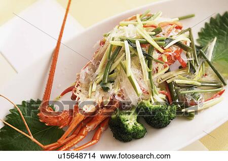 Picture - Lobster and vegetables on a plate. Fotosearch