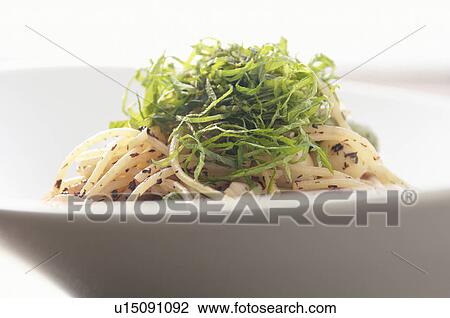 Stock Image - Pasta with garnish in a bowl. Fotosearch