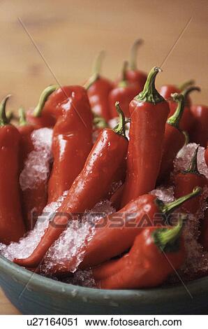 Red peppers on ice in a bowl View Large Photo Image Stock Image - Red peppers on ice in a bowl. Fotosearch