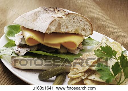 Sandwich, chips and pickles View Large Photo Image Stock Image - Sandwich, chips and pickles. Fotosearch