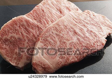 Stock Photo - Two slabs of beef. Fotosearch
