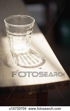 Empty glass on a table View Large Photo Image Picture - Empty glass on a table. Fotosearch