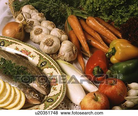 Stock Photo - A variety of vegetables and fish. Fotosearch