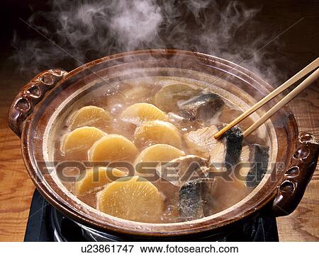 Stock Photo - Boiled yellowtail and Japanese white radish. Fotosearch