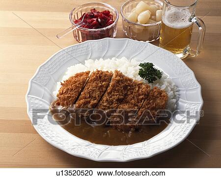 Curry with breaded pork cutlet View Large Photo Image Stock Image - Curry with breaded pork cutlet. Fotosearch