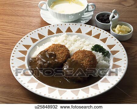Stock Image - Curry with croquettes. Fotosearch