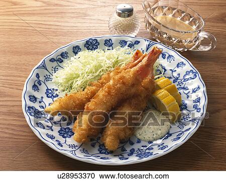 Stock Image - Prawns deep-fried in bread crumbs. Fotosearch