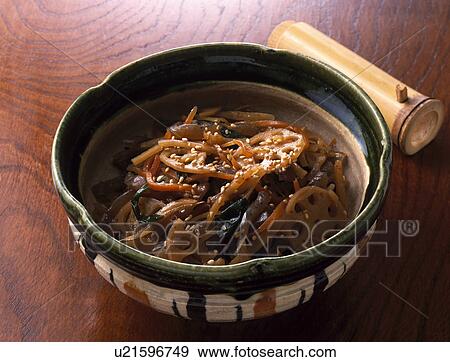 Stock Photo - Sautéed vegetables with soy sauce. Fotosearch