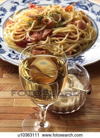 Spaghetti and a glass of wine View Large Photo Image Stock Image - Spaghetti and a glass of wine. Fotosearch