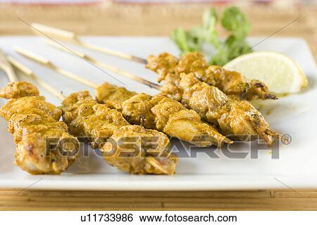 Chicken satay View Large Photo Image Stock Photograph - Chicken satay. Fotosearch