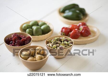 Stock Image - Dry fruits, nuts and vegetables. Fotosearch