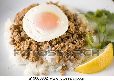 Fried rice with basil View Large Photo Image Stock Image - Fried rice with basil. Fotosearch