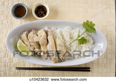 Hainanese chicken rice View Large Photo Image Stock Image - Hainanese chicken rice. Fotosearch