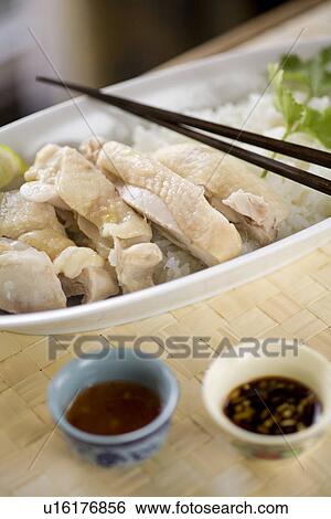 Hainanese chicken rice View Large Photo Image Stock Photograph - Hainanese chicken rice. Fotosearch