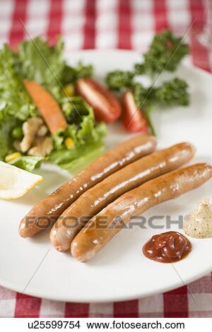 Sausage and vegetables View Large Photo Image Picture - Sausage and vegetables. Fotosearch