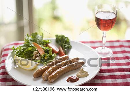 Stock Photograph - Sausage and wine. Fotosearch