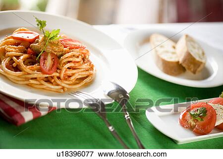 Spaghetti with tomato sauce View Large Photo Image Stock Photo - Spaghetti with tomato sauce. Fotosearch