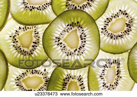 Kiwi slices, close-up (full frame) View Large Photo Image Stock Image - Kiwi slices, close-up (full frame). Fotosearch