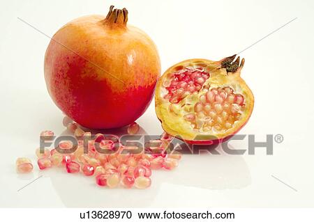 Pomegranate and Pomegranate Seeds, Close-Up View Large Photo Image Stock Image - Pomegranate and Pomegranate Seeds, Close-Up. Fotosearch