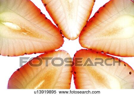 Stock Photography - Strawberries, cross section. Fotosearch