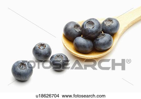 Wooden spoon with blueberries View Large Photo Image Picture - Wooden spoon with blueberries. Fotosearch
